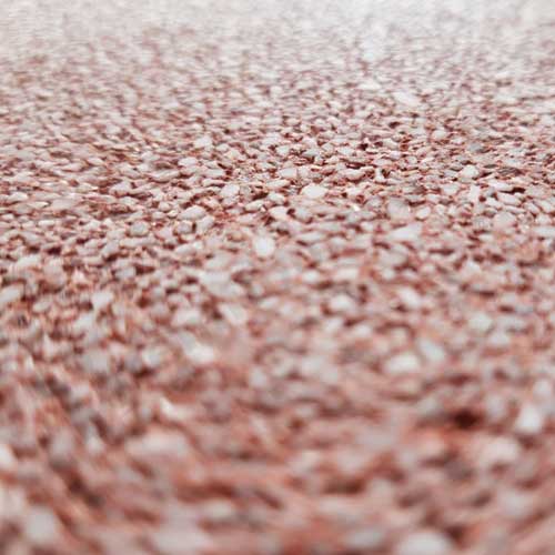 close up of eco friendly flooring with aggregate seed